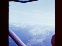 On patrol over the jungle at about 1500 feet altitude.